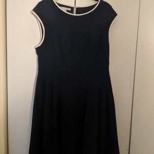 Navy blue A-line dress with white detailing